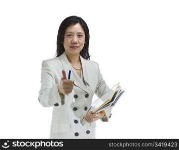 Asian woman dressed in business formal white suit giving thumbs up sign on white background