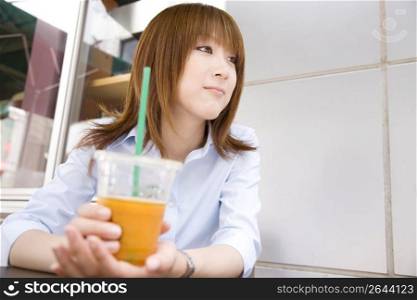 Asian woman drinking