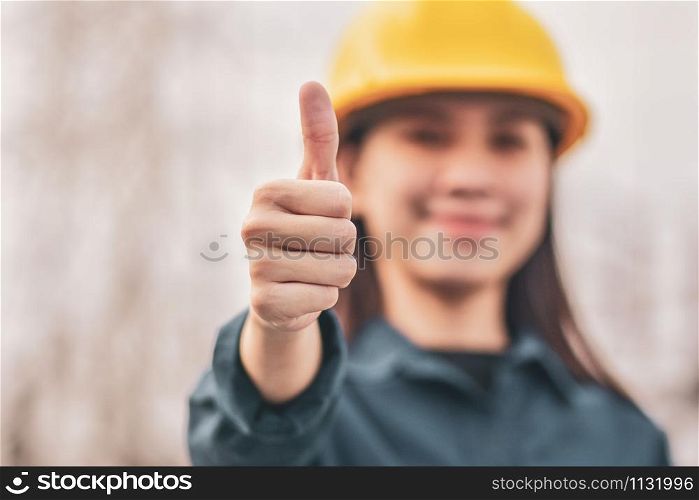 Asian Woman Engineering Yellow helmet hard hat safety