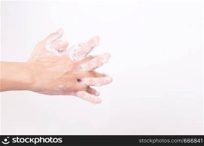 Asian woman hand are washing with soap bubbles on white background, Health and Lifestyle Concepts, Global Handwashing Day