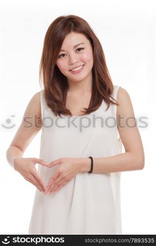 Asian woman holding hands in heart shape