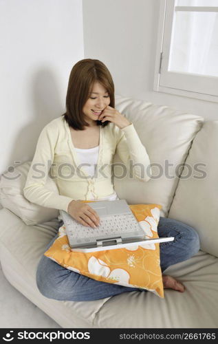 Asian woman on a laptop