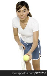 Asian Woman Playing Tennis