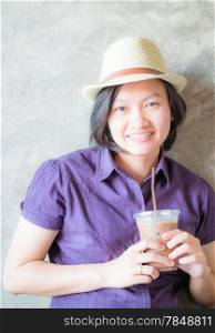 Asian woman smiling in coffee shop, stock photo
