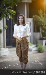 asian woman wearing thai period tradition clothes toothy smiling face