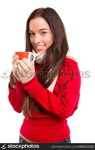 Asian woman wearing winter clothes and holding a cup of tea or coffee