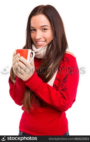 Asian woman wearing winter clothes and holding a cup of tea or coffee