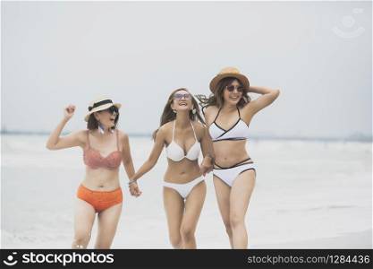 asian woman with bikini on beach
