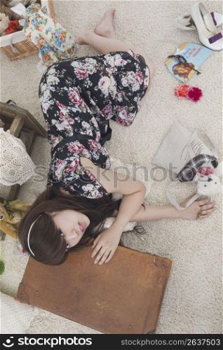 Asian woman with household still life