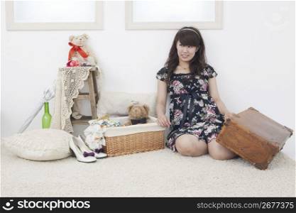 Asian woman with household still life