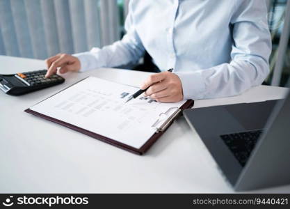 Asian Woman working by using a laptop computer Hands typing on keyboard. Working at office professional investor working new start up project