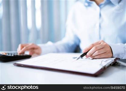 Asian Woman working by using a laptop computer Hands typing on keyboard. Working at office professional investor working new start up project