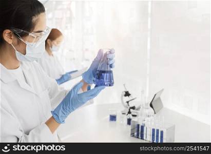asian woman working chemical project new discovery 2