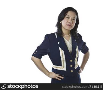 Asian women displaying attitude stance in business suit on white background