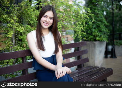 Asian women happy smile on relaxing time at outdoor