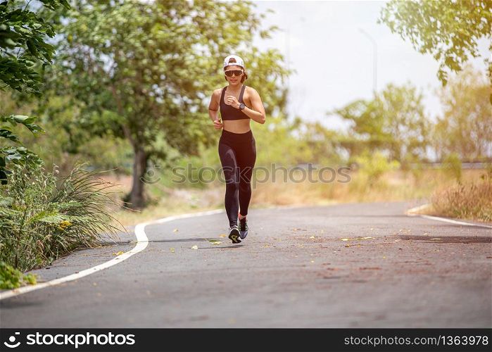 Asian women Running and jogging during outdoor on park