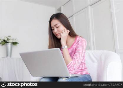 Asian women stressful working with a computer for a long time,Office syndrome concept