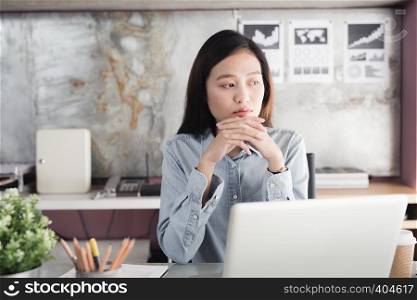 Asian women Stressful Working with a notebook for a long time,Office syndrome concept