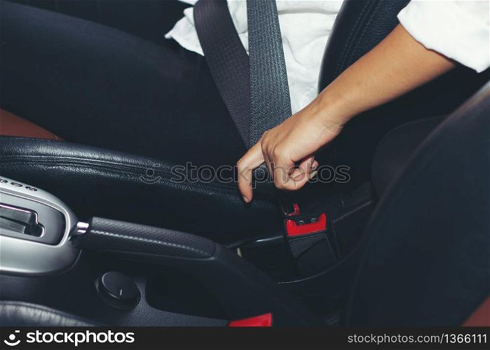 Asian women were locked car seat belt