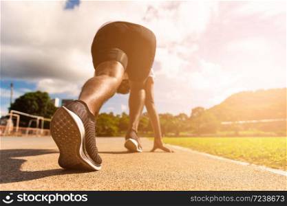 Asian young athlete sport runner black man active ready to start running training at the outdoor on the treadmill for a step forward, healthy exercise workout, closeup back on feet shoe