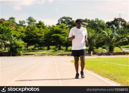 Asian young lifestyle athlete sport runner black man wear feet shoe active running training at the outdoor on the treadmill line road, healthy exercise workout