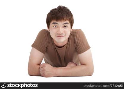 asian young man lying on the floor isolated on white