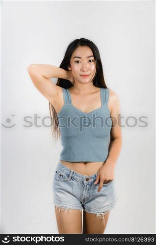 Asian young woman happy smile wearing a purple single line dress on white background.