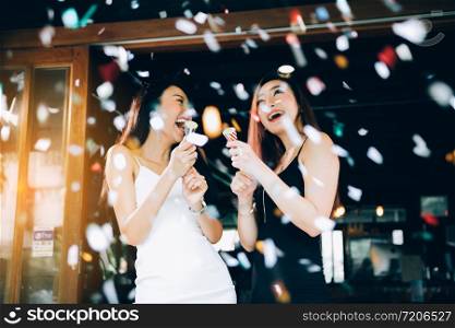 Asian young women having celebrate.