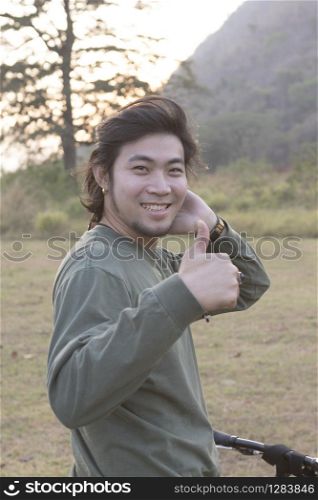 asian younger man toothy smiling face happiness emotion