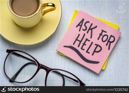 ask for help reminder note with a cup of coffee, support, assistance and business concept