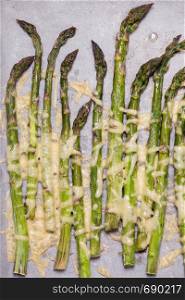 asparagus with cheese baked in the oven. traditional french dish