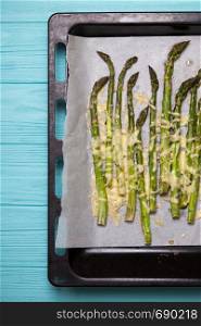 asparagus with cheese baked in the oven. traditional french dish