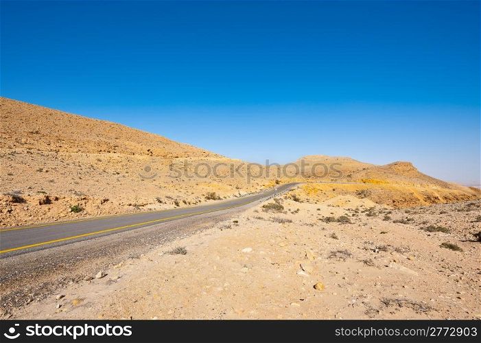 Asphalt Road above Grand Crater in Negev Desert, Israel
