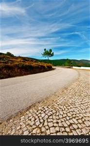 Asphalt Road between Hills in Portugal