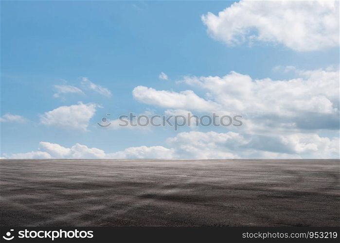 Asphalt road circuit and sky clouds with car tire brake