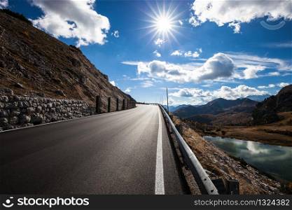 asphalt road in mountains. autumn landscape. Dolomites Alps, Italy