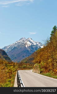 Asphalt Road in Piedmont on the Background of Snow-capped Alps