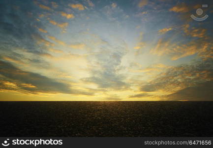 Asphalt road with dramatic sunrise sky , Horizontal format .