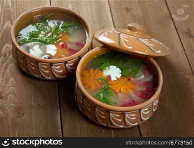 Aspic from meat decorated with egg, carrot,