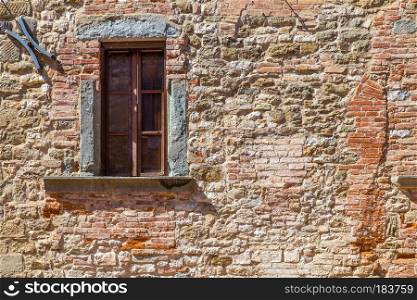 Assisi  Italy   Window on medieval stone wall