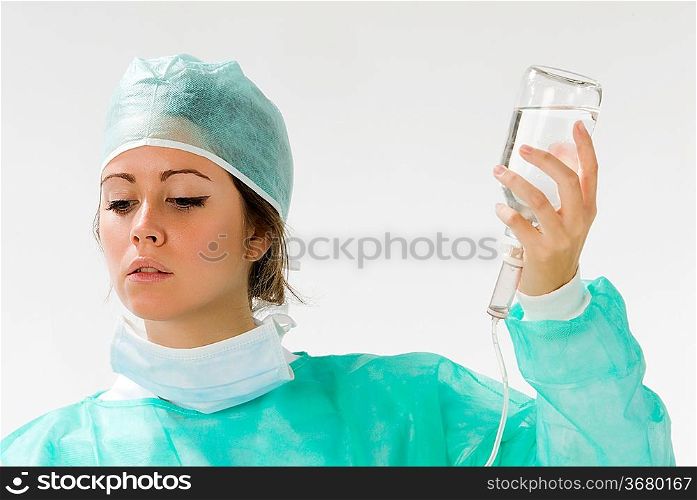 assistant in surgery with making a i.v.