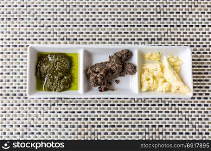 Assorted butter for bread, food background