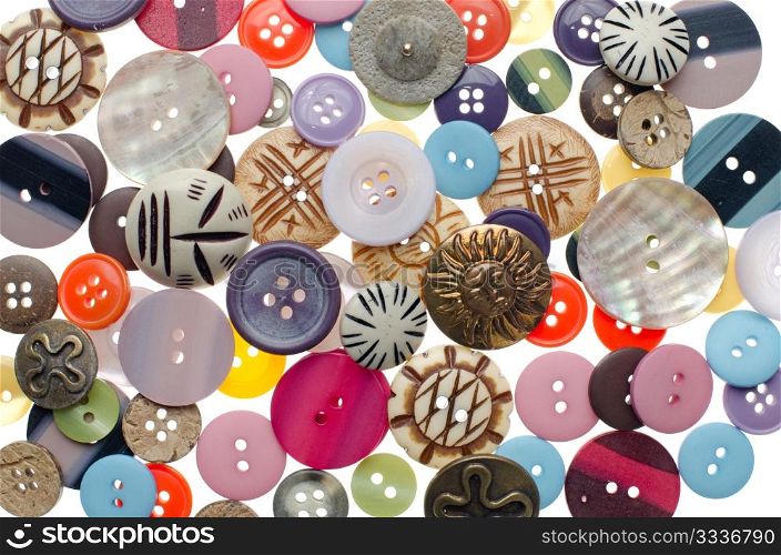 Assorted buttons as colorful background. Sewing accessories.