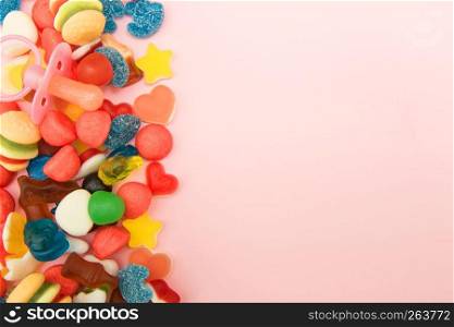 assorted candies on a pastel colored background