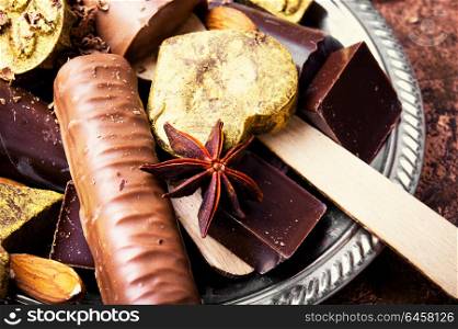 Assorted chocolate candies. Chocolate candies on stylish dish.Chocolate dessert.Luxury candy