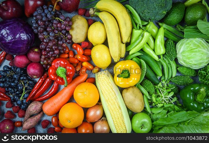 Assorted fresh ripe fruit red yellow purple and green vegetables mixed selection various , top view / vegetables and fruits background healthy food clean eating for heart life cholesterol diet health