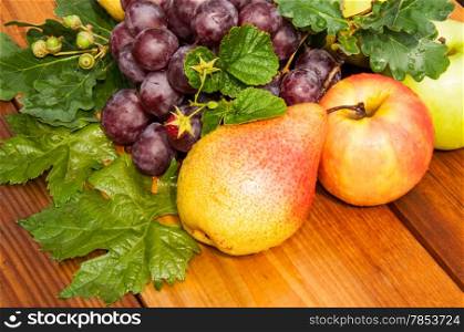 Assorted fruit on the old wooden table top