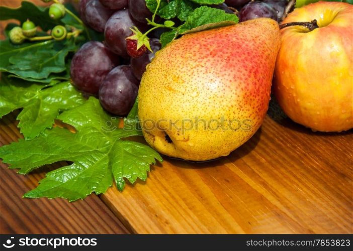 Assorted fruit on the old wooden table top