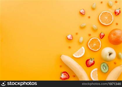 assorted fruit yellow background. High resolution photo. assorted fruit yellow background. High quality photo