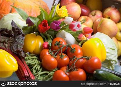 Assorted Fruits And Vegetables With Multicolored Tulips